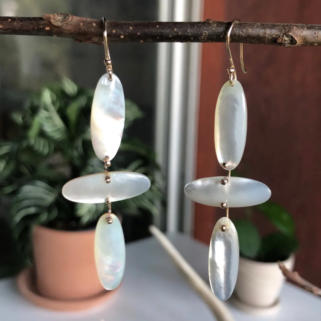 Falling petals mother of pearl earrings