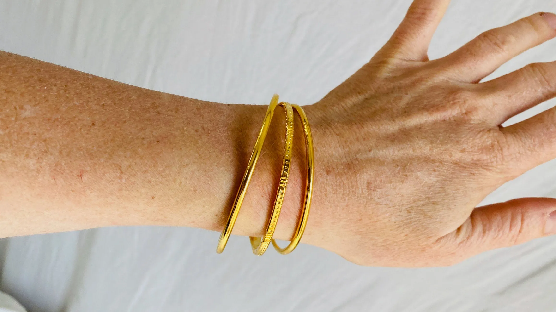 Trio of Golden Bangles. 24kt Gold Plated. Vermeil