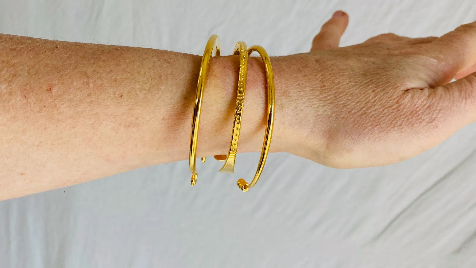 Trio of Golden Bangles. 24kt Gold Plated. Vermeil